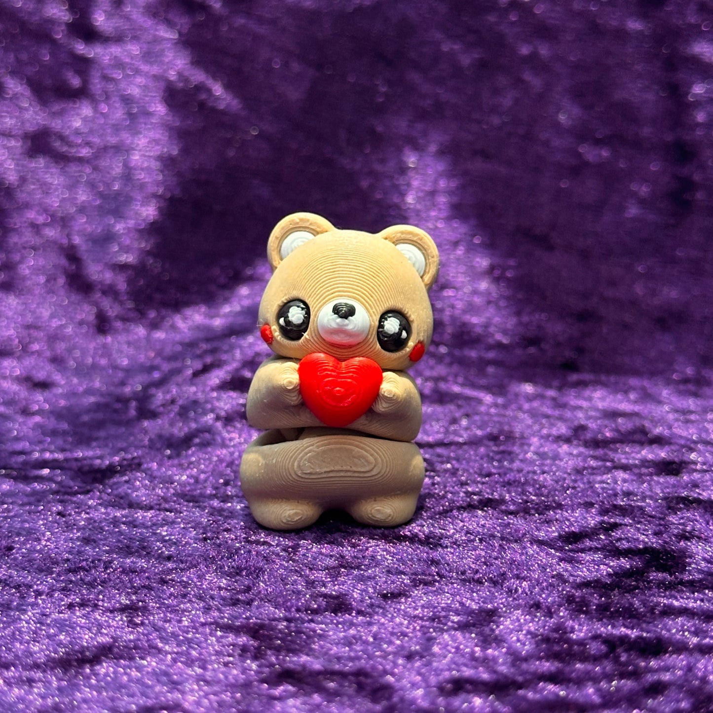 Teddy Bear Holding Heart